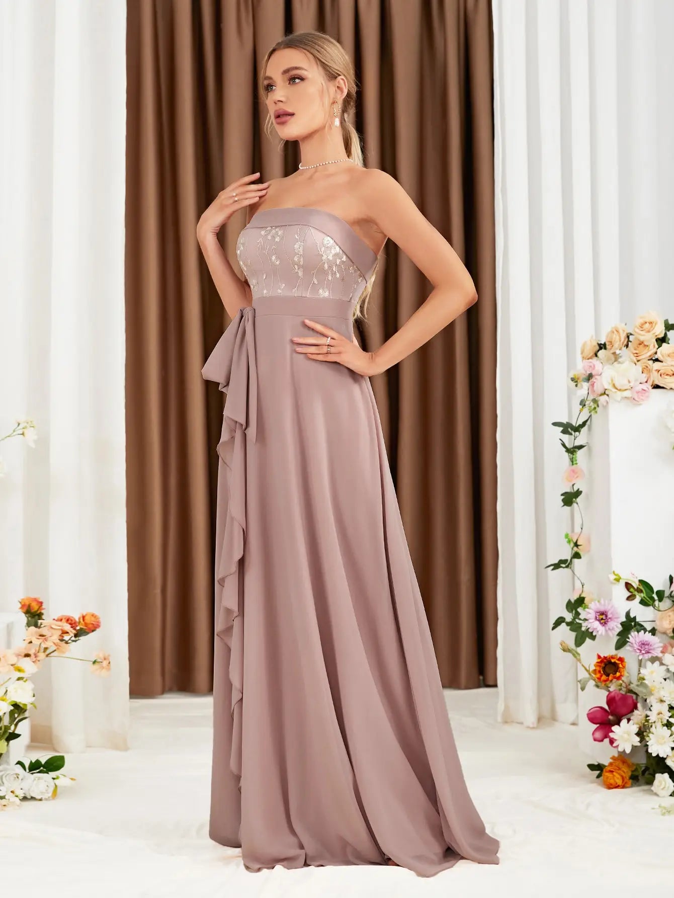 The adult formal dress is wrapped around the chest and decorated with a belt on the back